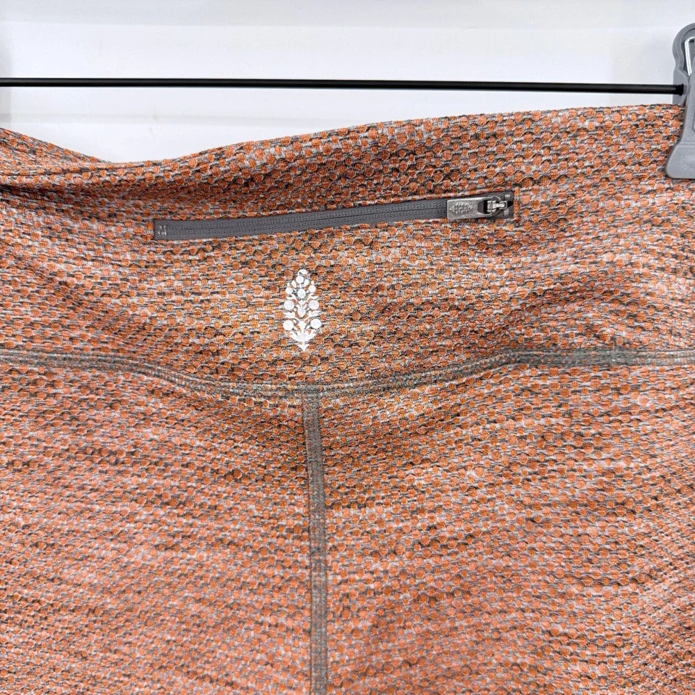 FP Movement Free People Orange‎ Honeycomb Ruffle Kick Flare Leggings Large